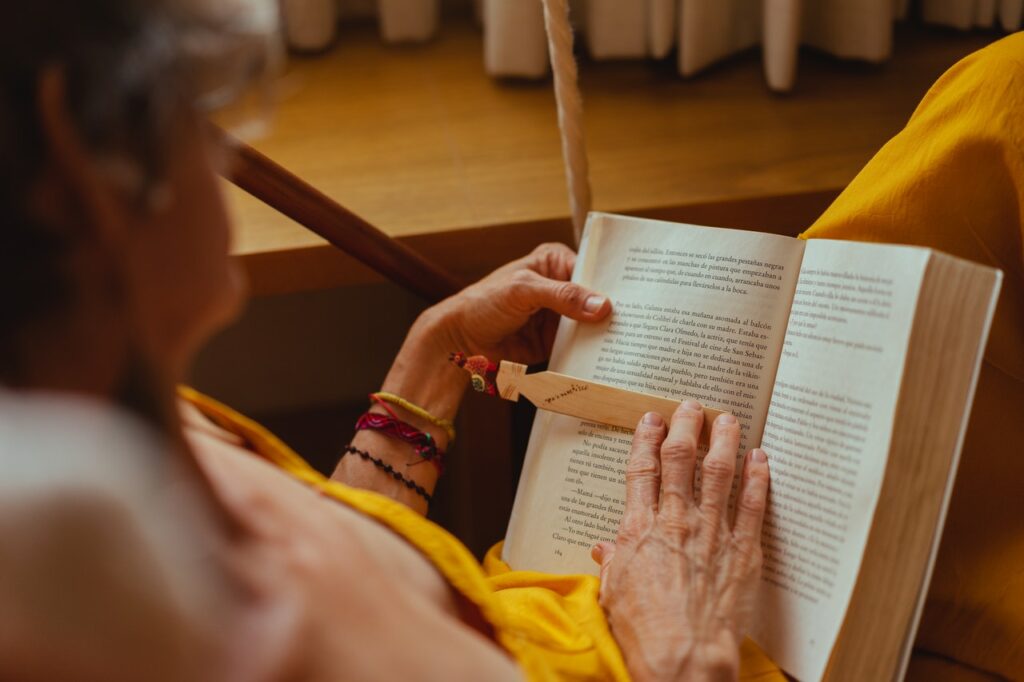 Senior reading a book