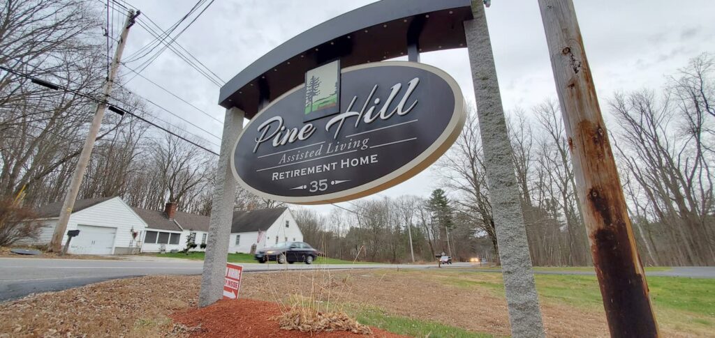 Pine Hill assisted living retirement home sign